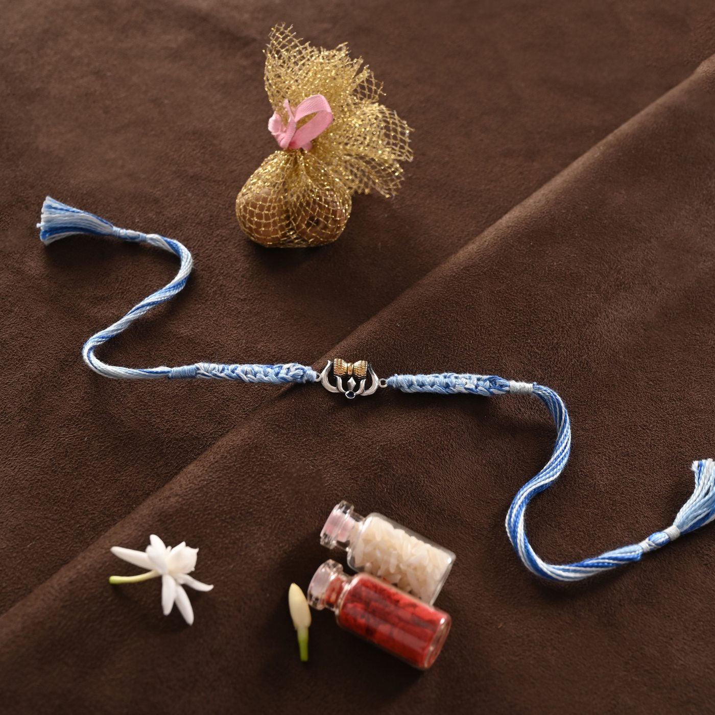Mahadev Rakhi, blue and white thread with silver charm